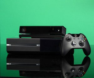 Xbox One, controller and sensor on green