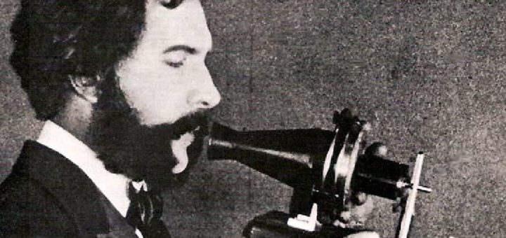 A picture of a man using Bell's first telephone